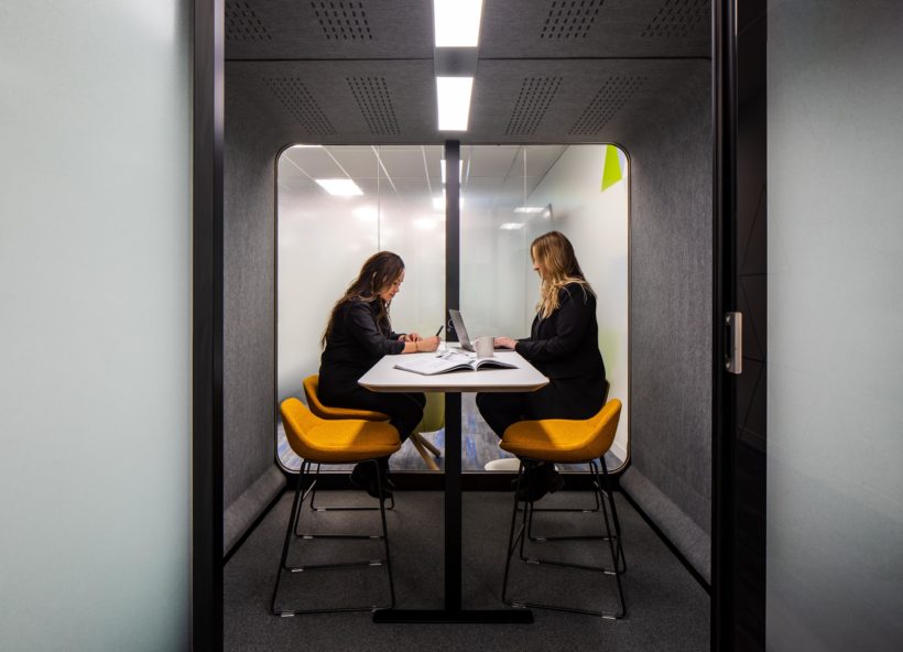 Two women working inside a Framery 2Q office pod