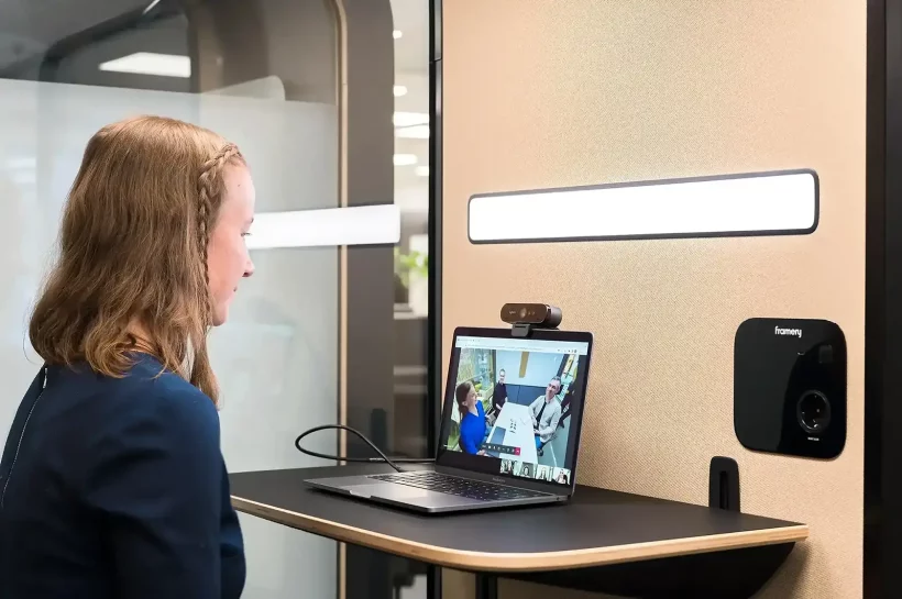 Person in a video conference in a Framery One office pod
