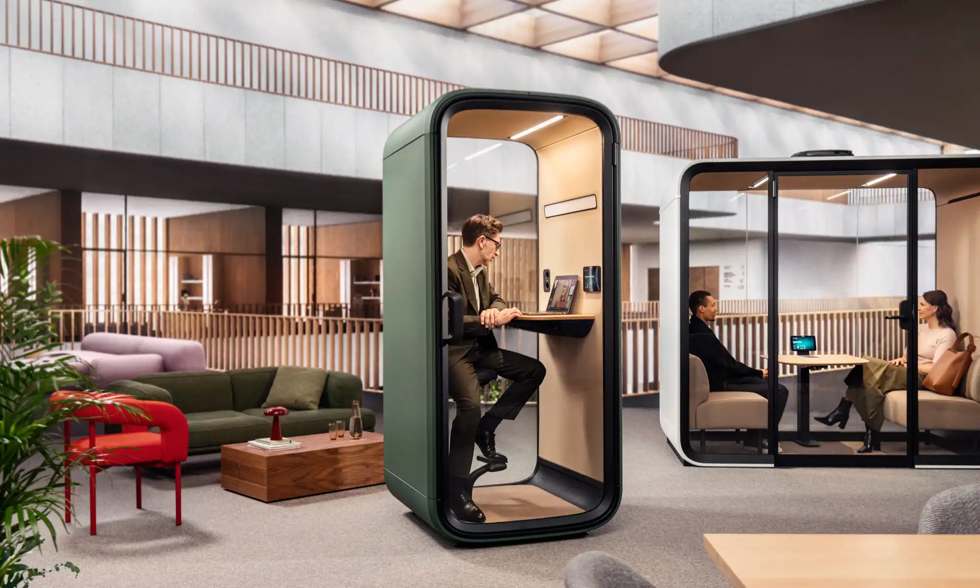Framery One Compact, a smart office phone booth in an open space office.
